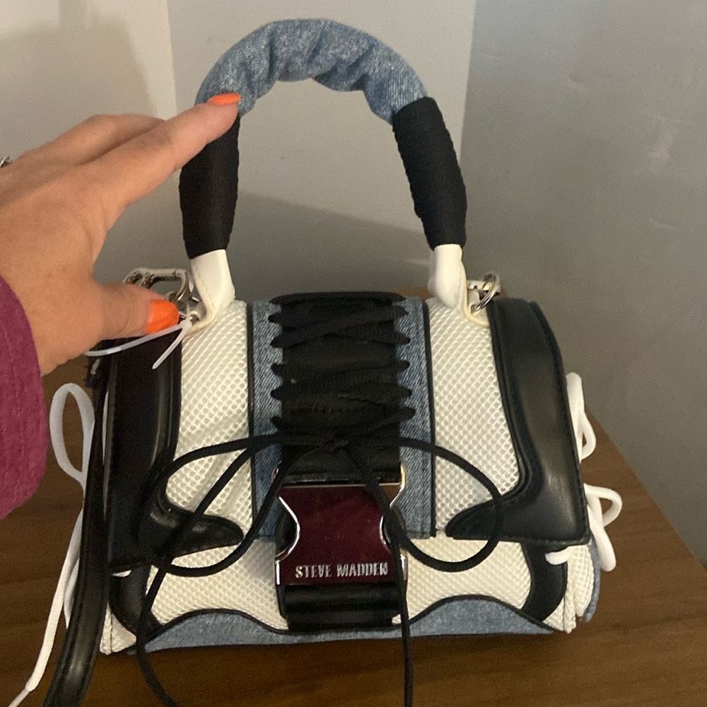 Never Used Steve Madden Diego Bag in blue.  The bag is 9” by 7”.